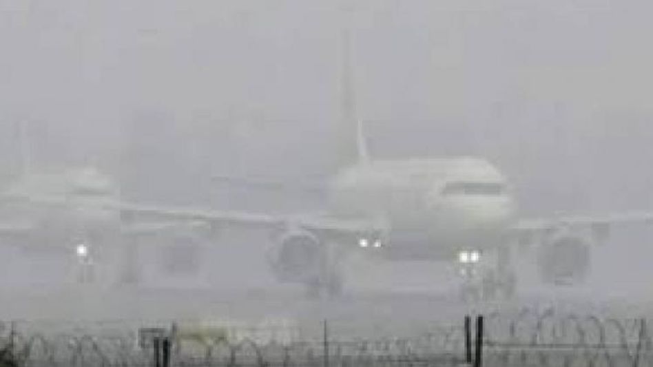 Flights, train services delayed due to dipping visibility as fog and severe winter chill blankets Delhi Flights, train services delayed due to dipping visibility as fog and severe winter chill blankets Delhi