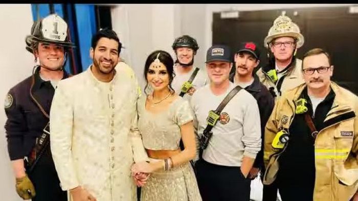 Couple gets stuck in elevator; misses reception