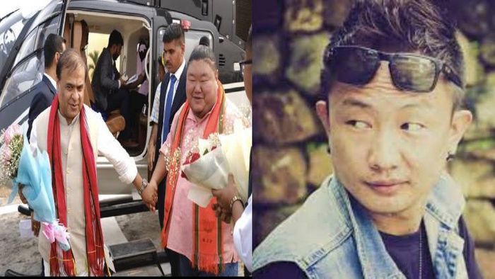 Assam Chief Minister Himanta Biswa Sarma holding hand of Nagaland minister Temjen Imna Along (L), Nagaland singer Alobo Naga (R)