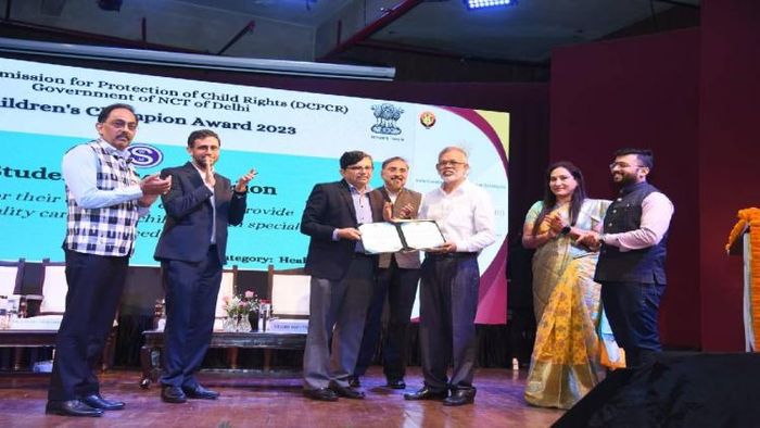 Kumud Kalita receiving Children's Champion Award