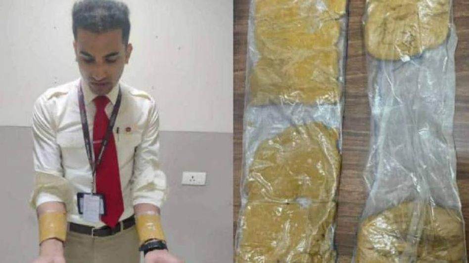 Air India cabin crew caught smuggling 1.4 kg gold concealed under his uniform Air India cabin crew caught smuggling 1.4 kg gold concealed under his uniform