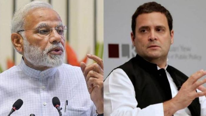 Prime Minister Narendra Modi (L), Congress leader Rahul Gandhi (R)