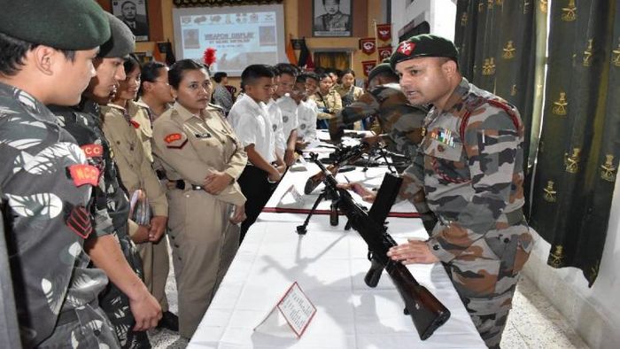 Assam Rifles displaying weapons