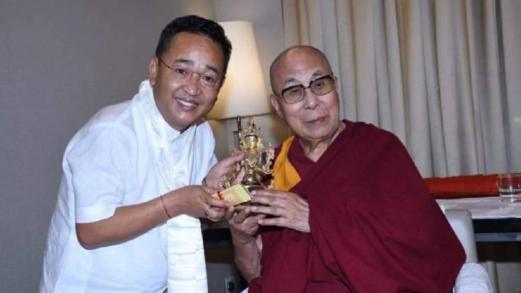 Sikkim chief minister Prem Singh Tamang (L), His Holiness the Dalai Lama (R)