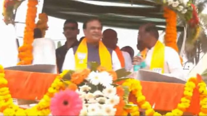 Assam Chief Minister Himanta Biswa Sarma leading a roadshow in Karnataka
