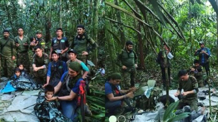 Soldiers and Indigenous men pose for a photo with the four Indigenous brothers who were missing after a deadly plane crash, in the Solano jungle, Caqueta state, Colombia
