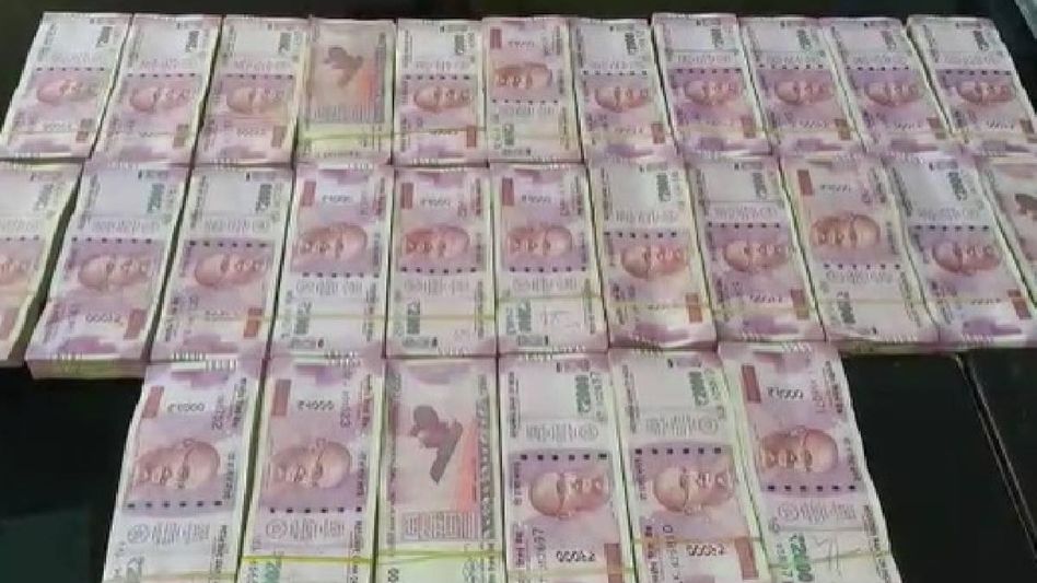 Police seize Rs 56 lakh from hidden chamber of car in Tripura Police seize Rs 56 lakh from hidden chamber of car in Tripura
