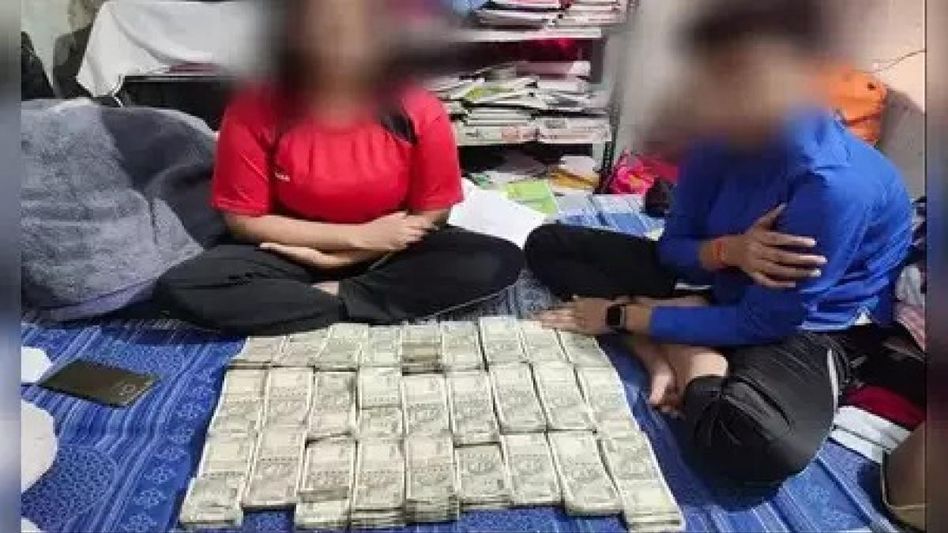 Uttar Pradesh: Cop faces probe after family takes selfie with currency notes worth Rs 14 lakh Uttar Pradesh: Cop faces probe after family takes selfie with currency notes worth Rs 14 lakh