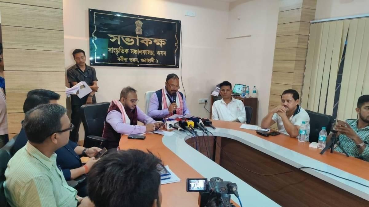 Assam Minister Bimal Borah (C) addressing a press conference