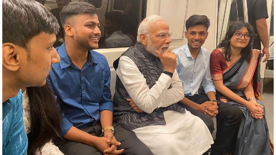 PM Modi takes a ride in metro to attend Delhi University event PM Modi takes a ride in metro to attend Delhi University event