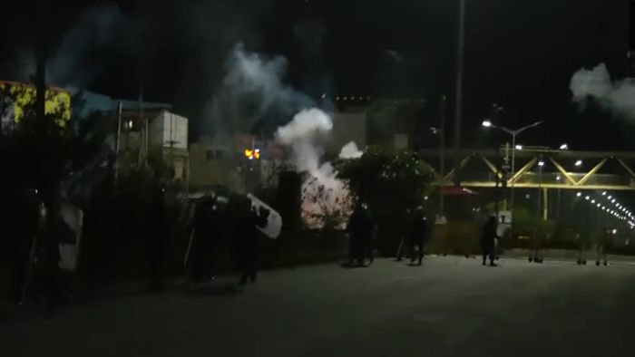 Image of crowd infront of BJP office in Imphal