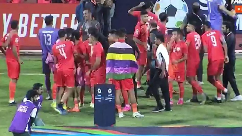 Manipuri footballer ignites controversy with 'Meitei Flag' draping at SAFF medal event Manipuri footballer ignites controversy with 'Meitei Flag' draping at SAFF medal event