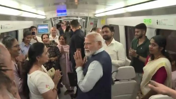 Prime Minister Narendra Modi inside Delhi Metro while on his way to the Convention Centre