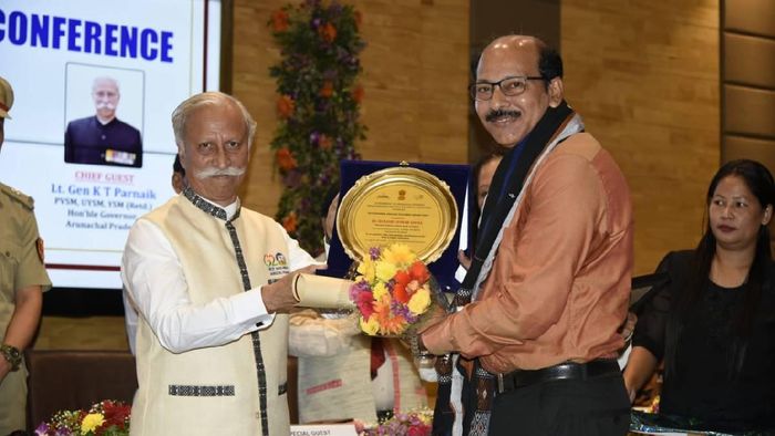 Professor Dr SK Sinha being felicitated with Outstanding College Teachers Award.