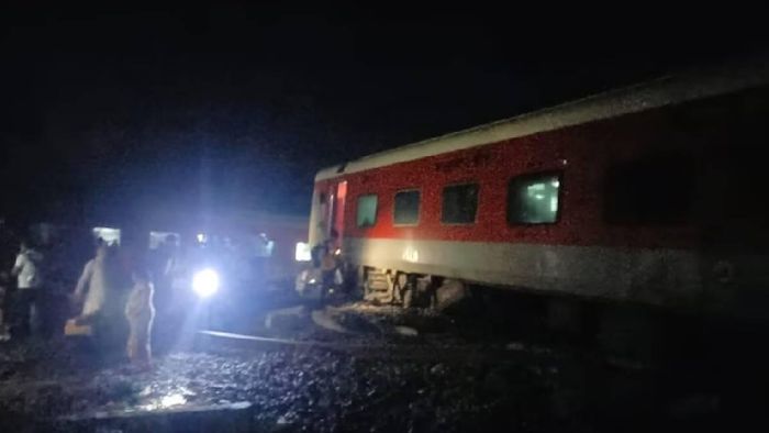Rescue operations underway at the accident site where the coaches of the North East Express train derailed