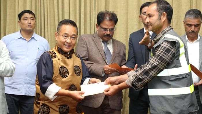 SIkkim: CM Tamang distributes distress relief tokens to flood-affected construction workers