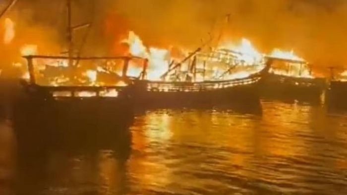 A fire broke out in a jetty area in Visakhapatnam in the early hours of Monday in which at least 35 fishing boats were gutted.