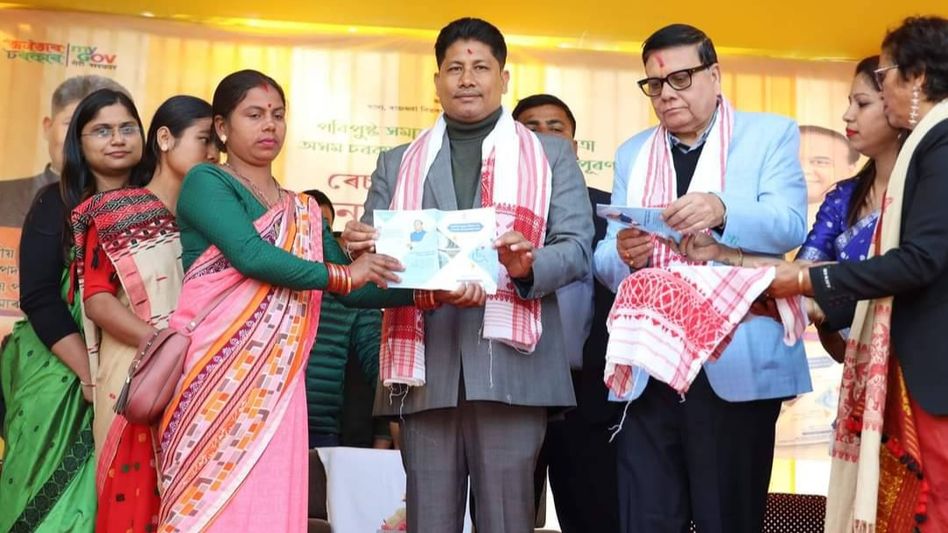 Assam Minister Pijush Hazarika distributes ration cards to beneficiaries Assam Minister Pijush Hazarika distributes ration cards to beneficiaries