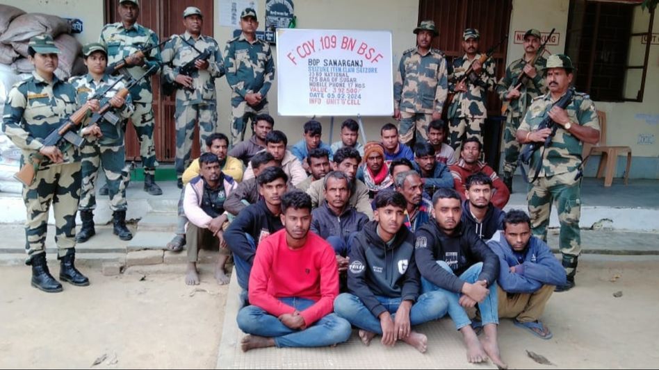 Tripura: BSF apprehends 23 Bangladeshi smugglers, seizes large quantity of sugar Tripura: BSF apprehends 23 Bangladeshi smugglers, seizes large quantity of sugar