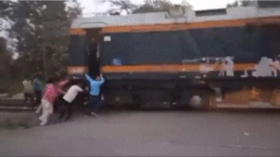 Uttar Pradesh: Railway employees push train coach due to technical glitch in Amethi Uttar Pradesh: Railway employees push train coach due to technical glitch in Amethi