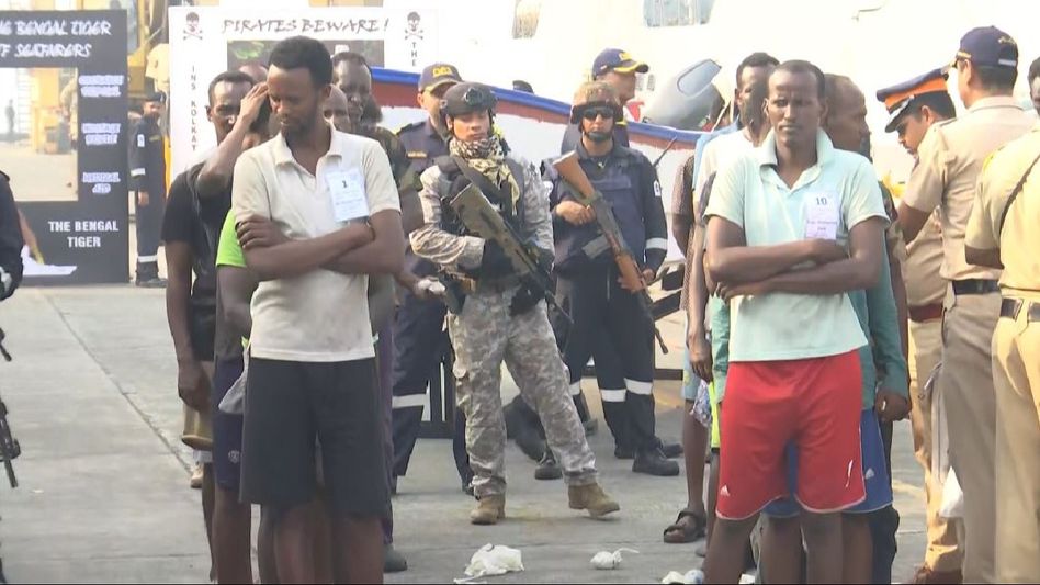 Navy transfers 35 Somali pirates to Mumbai Police after completion of customs and immigration procedures Navy transfers 35 Somali pirates to Mumbai Police after completion of customs and immigration procedures