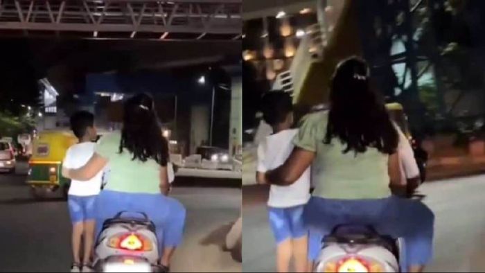 Bengaluru couple navigates heavy traffic on scooter with child on footrest