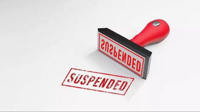 Two ACS officers, Jharnajyoti Patgiri and Pinky Dutta, have been suspended for not reporting to their new positions.