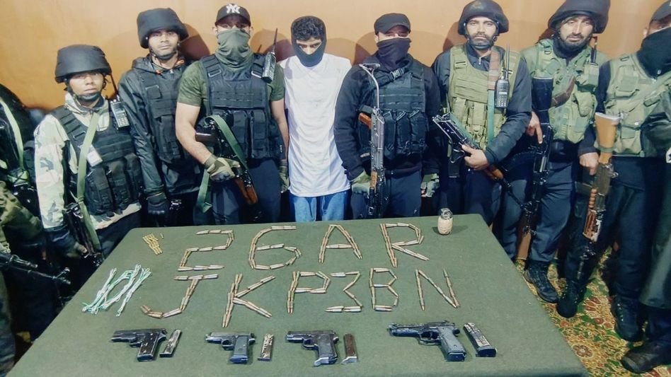 Terrorist associate nabbed with arms cache in J&K's Bandipora Terrorist associate nabbed with arms cache in J&K's Bandipora
