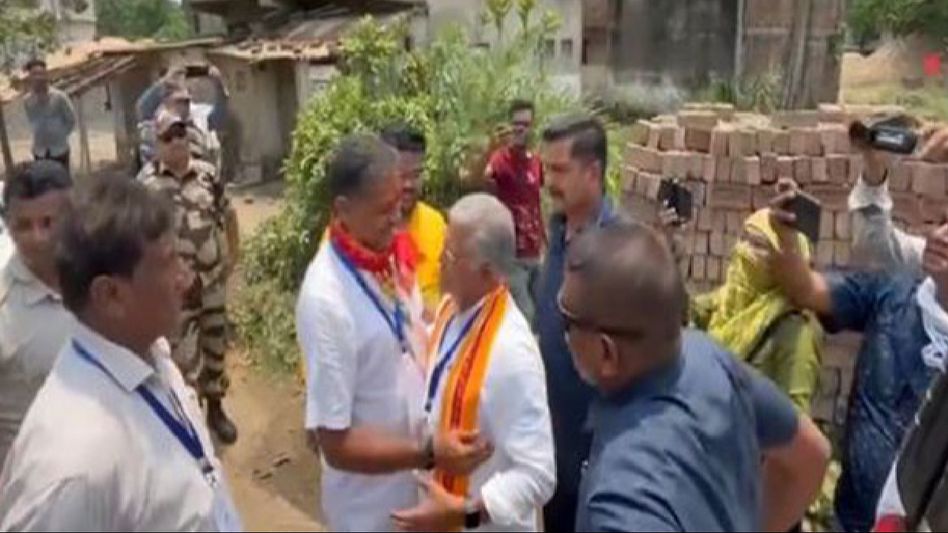 Amid poll violence, BJP candidate Dilip Ghosh and TMC's Kirti Azad display rare act of bonhomie Amid poll violence, BJP candidate Dilip Ghosh and TMC's Kirti Azad display rare act of bonhomie