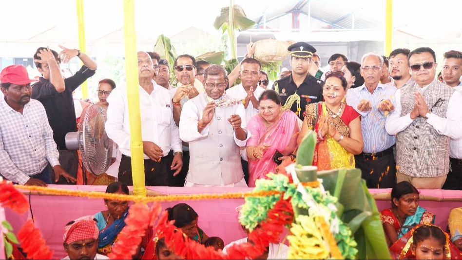Sikkim Governor Lakshman Prasad Acharya blesses 108 couples at tribal collective marriage ceremony in Siliguri Sikkim Governor Lakshman Prasad Acharya blesses 108 couples at tribal collective marriage ceremony in Siliguri