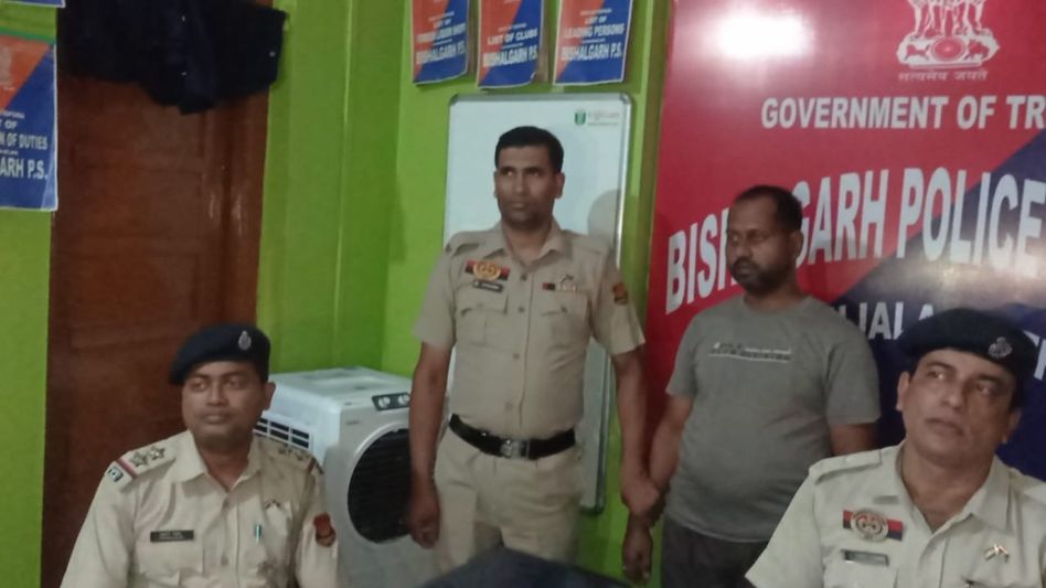 Tripura: NIA apprehends most wanted human trafficker Hannan Mia, en route to Guwahati for trial Tripura: NIA apprehends most wanted human trafficker Hannan Mia, en route to Guwahati for trial