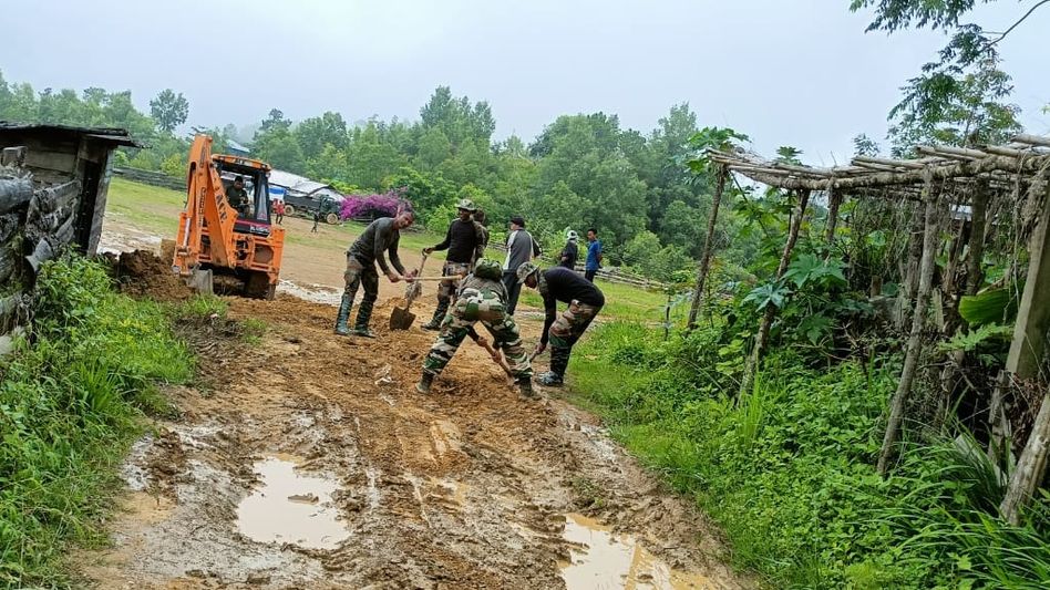 Assam Rifles and villagers repair critical border road in Nagaland Assam Rifles and villagers repair critical border road in Nagaland