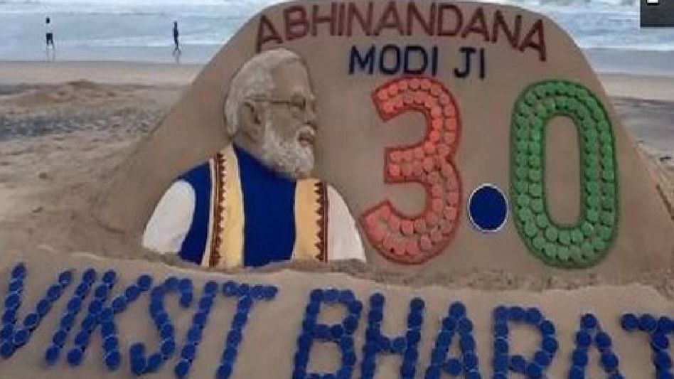 Sudarsan Pattnaik crafts sand Sculpture to congratulate PM-designate Narendra Modi in Puri Sudarsan Pattnaik crafts sand Sculpture to congratulate PM-designate Narendra Modi in Puri
