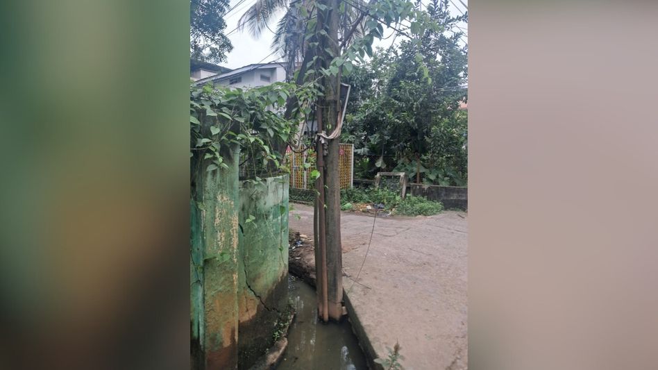 Guwahati man shares concerns over electric poles constructed on drains. See post Guwahati man shares concerns over electric poles constructed on drains. See post