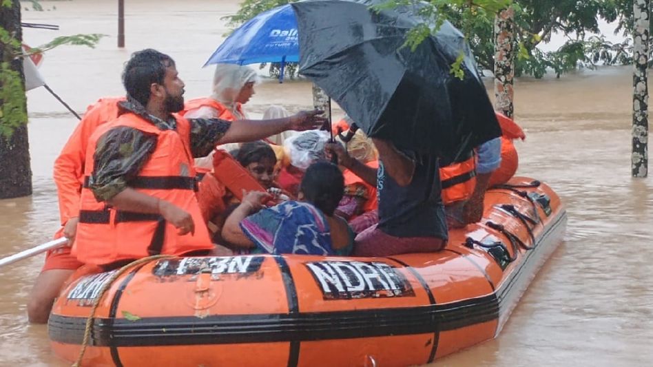 Tripura: NDRF conducts extensive flood rescue operation, 1479 people evacuated Tripura: NDRF conducts extensive flood rescue operation, 1479 people evacuated
