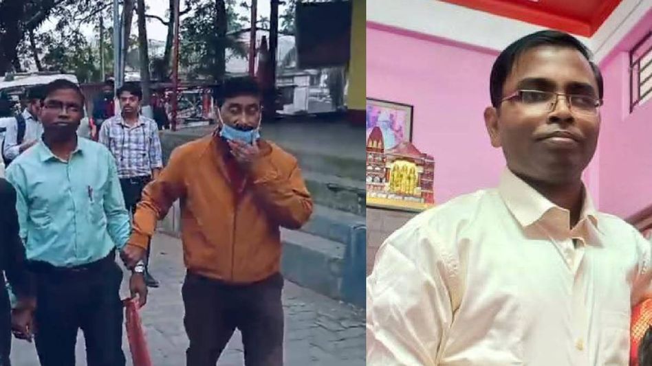 Assam: Teacher caught red-handed accepting bribe near Sribhumi immersion ghat Assam: Teacher caught red-handed accepting bribe near Sribhumi immersion ghat