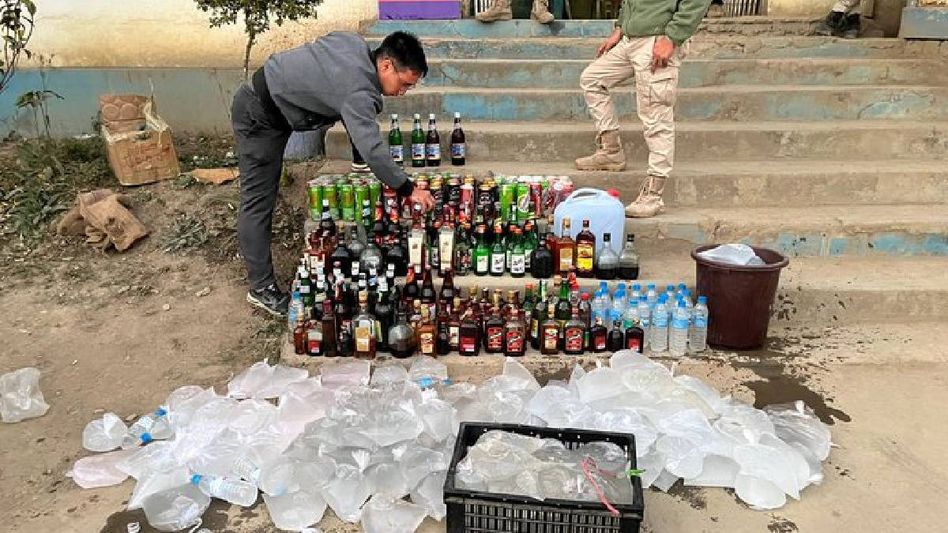 Manipur Police seizes and disposes large quantity of illicit liquor bottles in Churachandpur Manipur Police seizes and disposes large quantity of illicit liquor bottles in Churachandpur