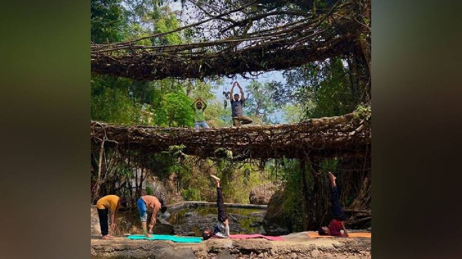 Yoga enthusiasts assemble at Meghalaya's Double-Decker Root Bridge Yoga enthusiasts assemble at Meghalaya's Double-Decker Root Bridge