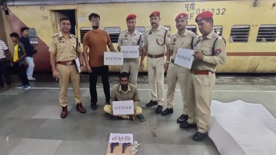 Assam cops seize illegal firearms from passenger at Guwahati Railway Station Assam cops seize illegal firearms from passenger at Guwahati Railway Station