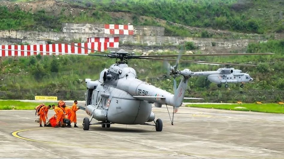 Helicopters deploy NDRF teams to North Sikkim for relief operations Helicopters deploy NDRF teams to North Sikkim for relief operations