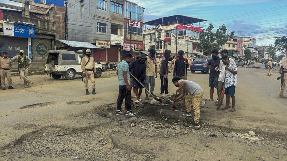 Brooms, not bars: Manipur Police's unique approach for protest management Brooms, not bars: Manipur Police's unique approach for protest management