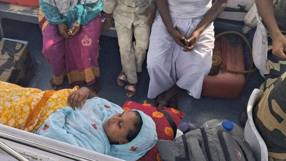 Assam: BSF troops evacuate critically ill woman by boat, win praise from Dhubri villagers Assam: BSF troops evacuate critically ill woman by boat, win praise from Dhubri villagers