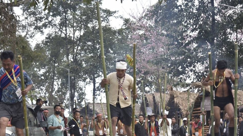 Tourists join Naga bamboo stilt race as Hornbill Festival draws strong global participation Tourists join Naga bamboo stilt race as Hornbill Festival draws strong global participation