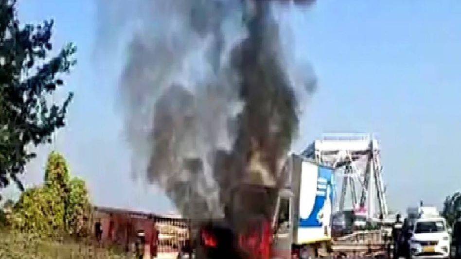 Mid-day meal distribution van catches fire near Saraighat Bridge, traffic halt in Guwahati Mid-day meal distribution van catches fire near Saraighat Bridge, traffic halt in Guwahati