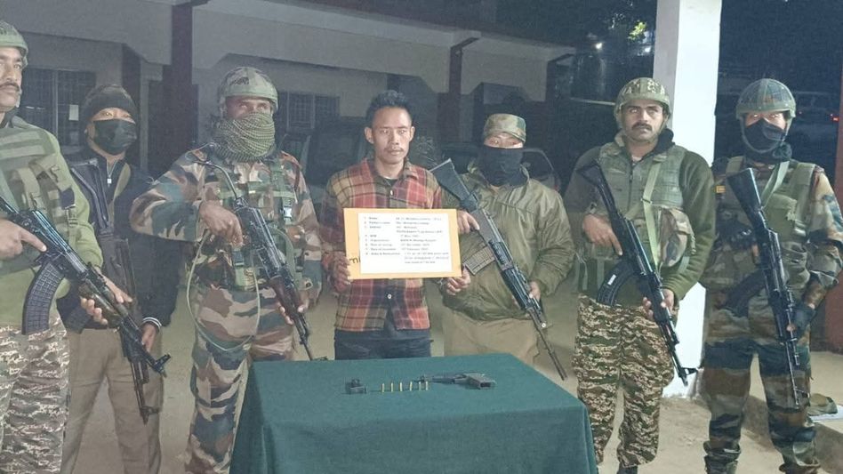 NSCN-K cadre lays down arms before security forces in Arunachal's Tirap NSCN-K cadre lays down arms before security forces in Arunachal's Tirap