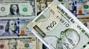 Rupee closes at record low of 96.35 against U.S. dollar amid oil price surge Rupee closes at record low of 96.35 against U.S. dollar amid oil price surge