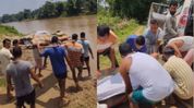 Assam: Villagers forced to carry deceased man across river for funeral rites as lack of bridge hampers access Assam: Villagers forced to carry deceased man across river for funeral rites as lack of bridge hampers access