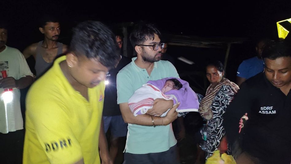 Amid Assam floods, girl born on submerged road after dramatic SDRF rescue in Sivasagar Amid Assam floods, girl born on submerged road after dramatic SDRF rescue in Sivasagar