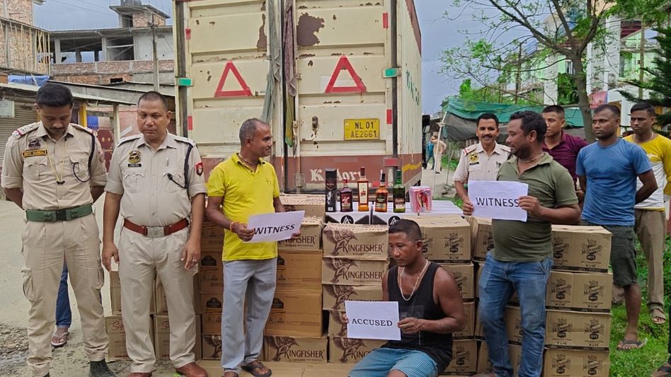 Assam: Dholai Police seize huge consignment of foreign liquor headed for Mizoram, truck driver arrested Assam: Dholai Police seize huge consignment of foreign liquor headed for Mizoram, truck driver arrested