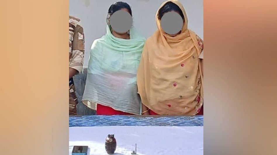 Two women held in Manipur for alleged illegal arms trade, hand grenade seized Two women held in Manipur for alleged illegal arms trade, hand grenade seized